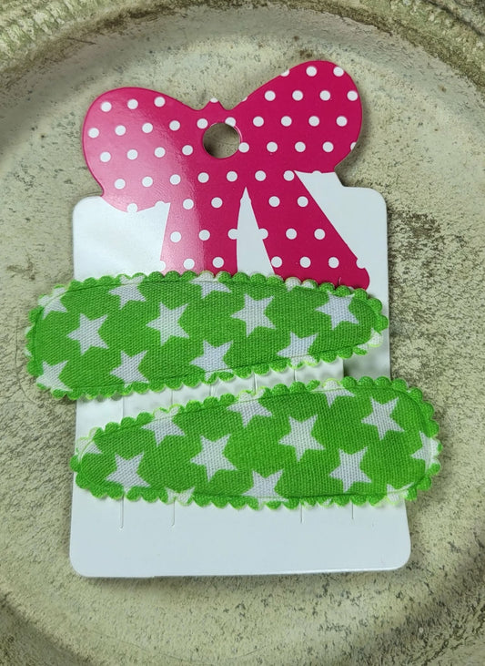 Kind klikspeld groen met witte sterren