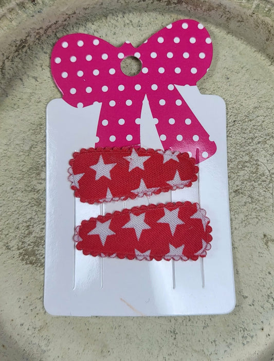 Baby klikspeld rood met witte sterren