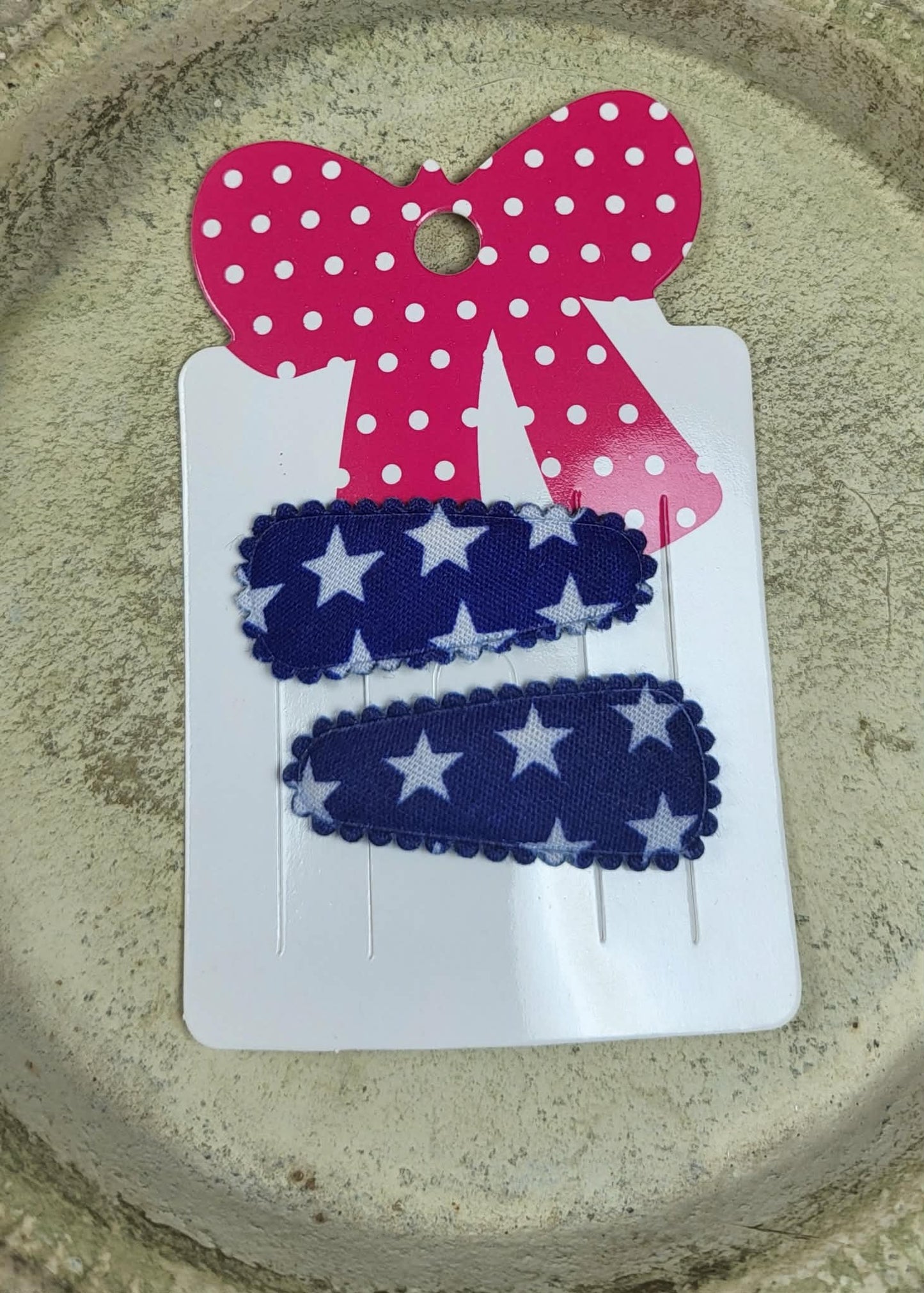 Baby klikspeld donkerblauw met witte sterren