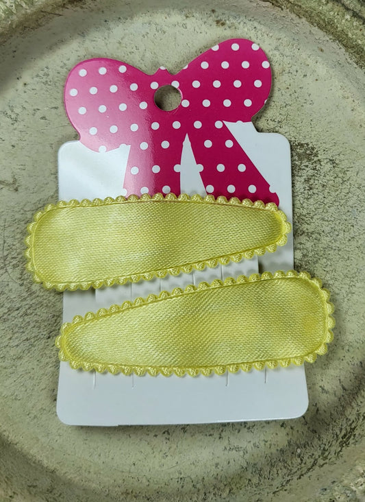 Kind klikspeld satijn lichtgeel