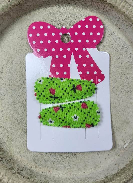 Baby klikspeld groen met kleine bloemetjes