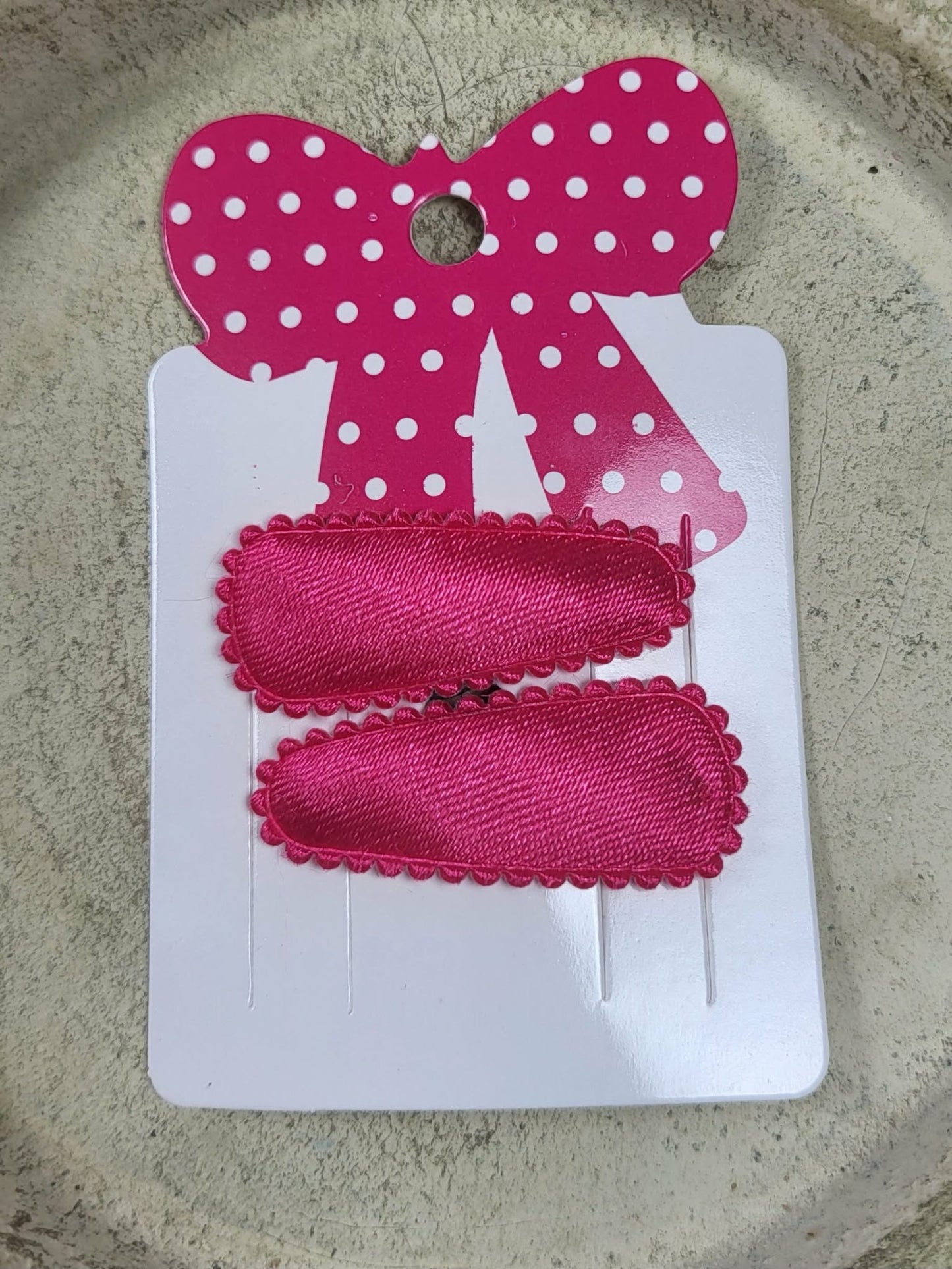 Baby klikspeld satijn donkerroze