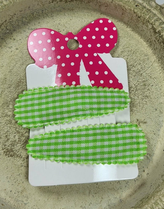 Kind klikspeld geruit groen