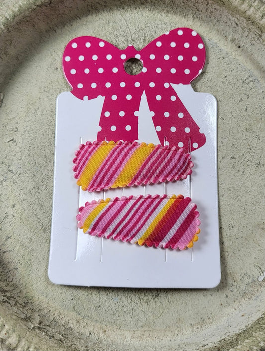 Baby klikspeld gestreepte roze tinten