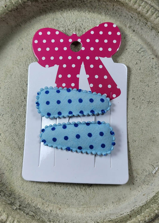 Baby klikspeld lichtblauw met donkerblauwe stippen