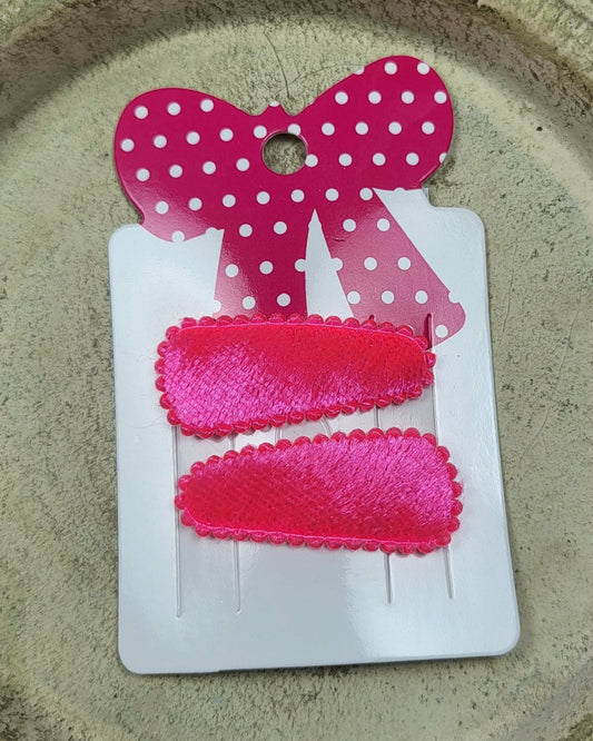 Baby klikspeld fluweel neonroze