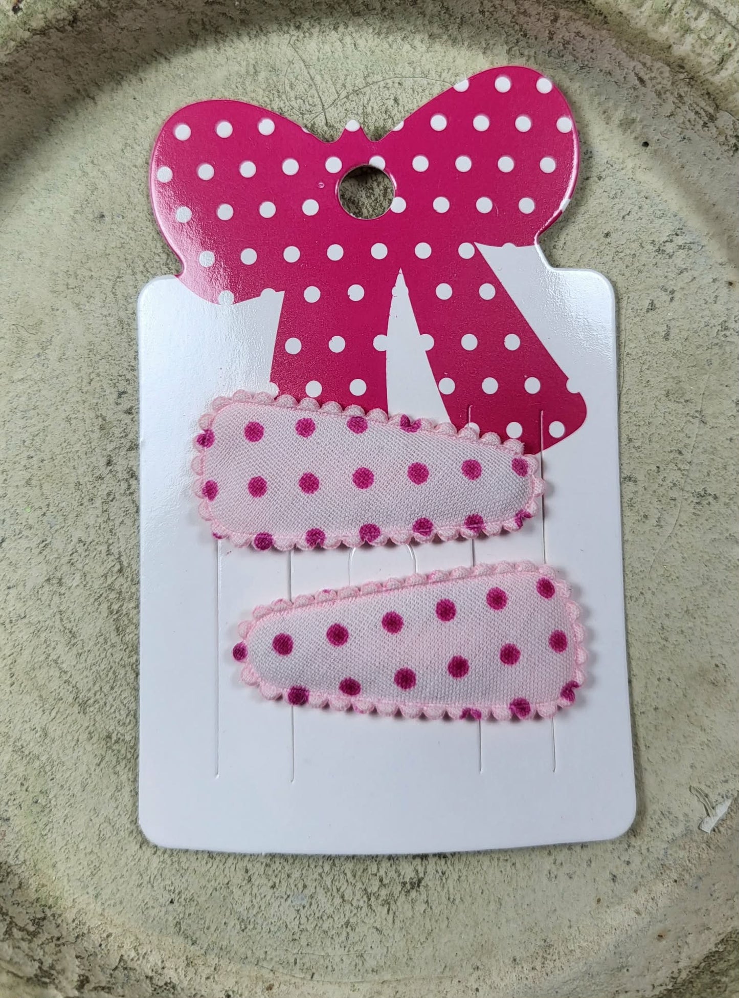 Baby klikspeld lichtroze met donkerroze stippen