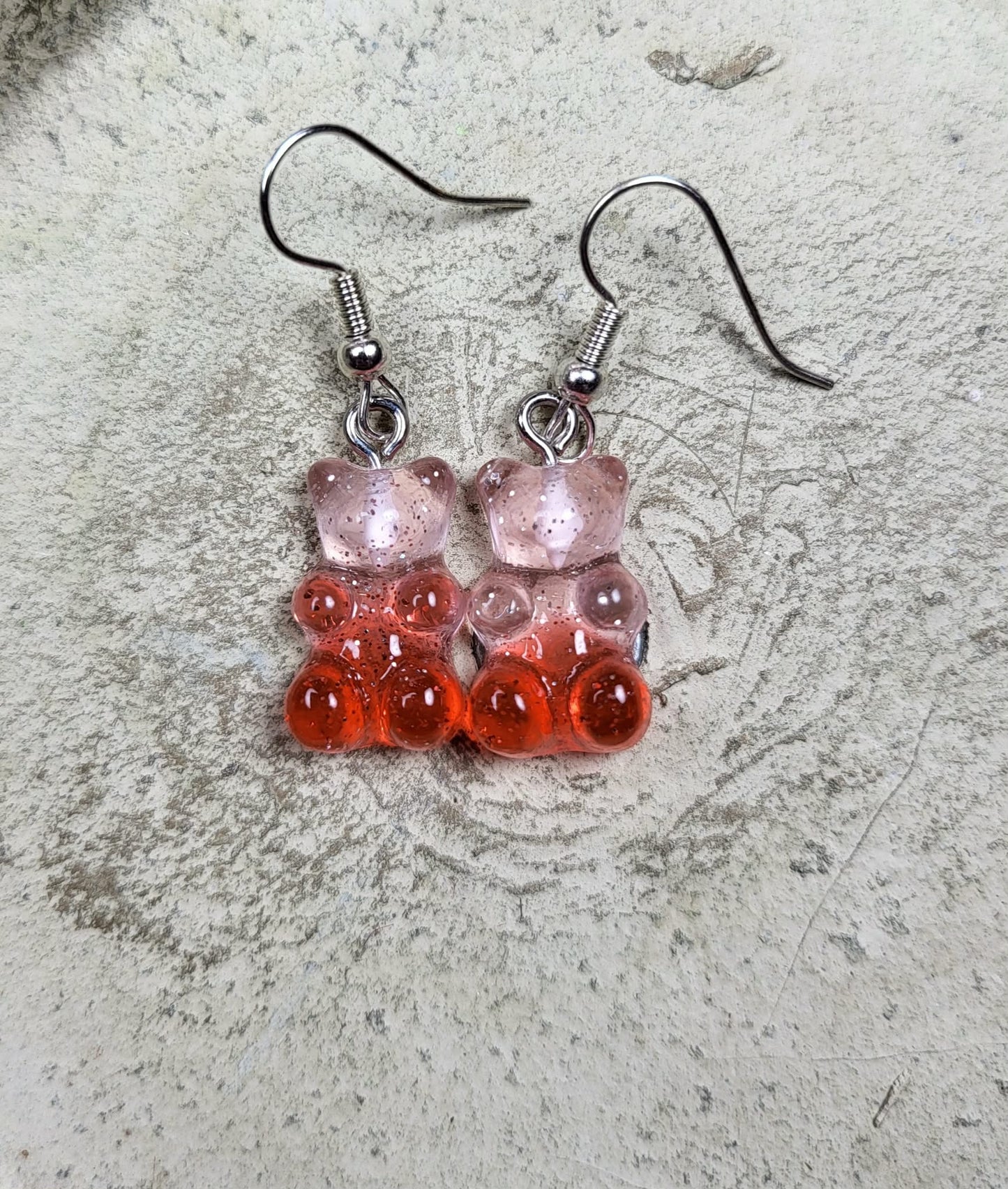 Oorbel hanger gummibeertje roze-oranje transparant