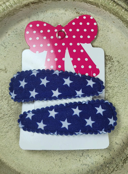 Kind klikspeld donkerblauw met witte sterren