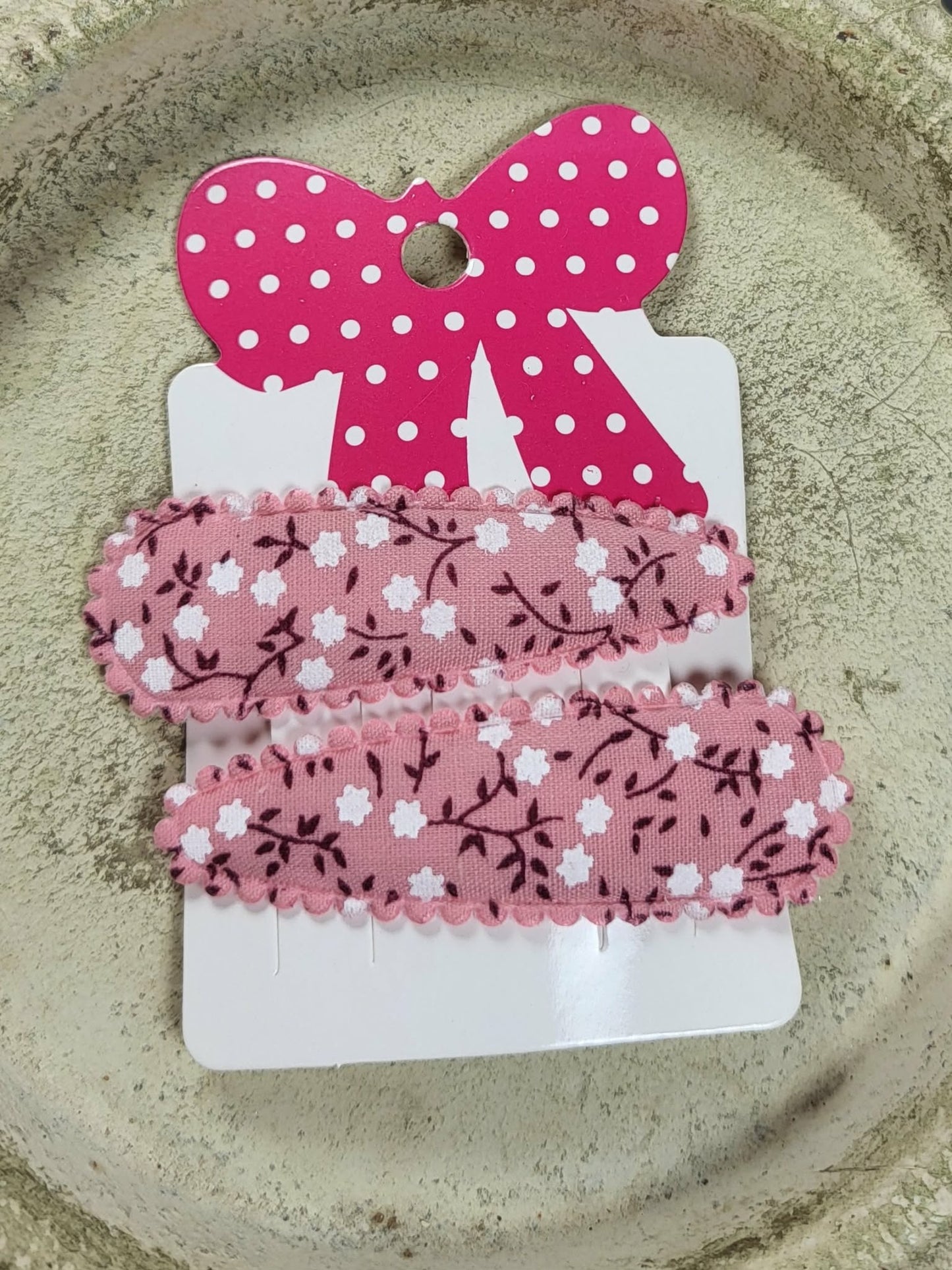 Kind klikspeld oud roze vintage bloemen