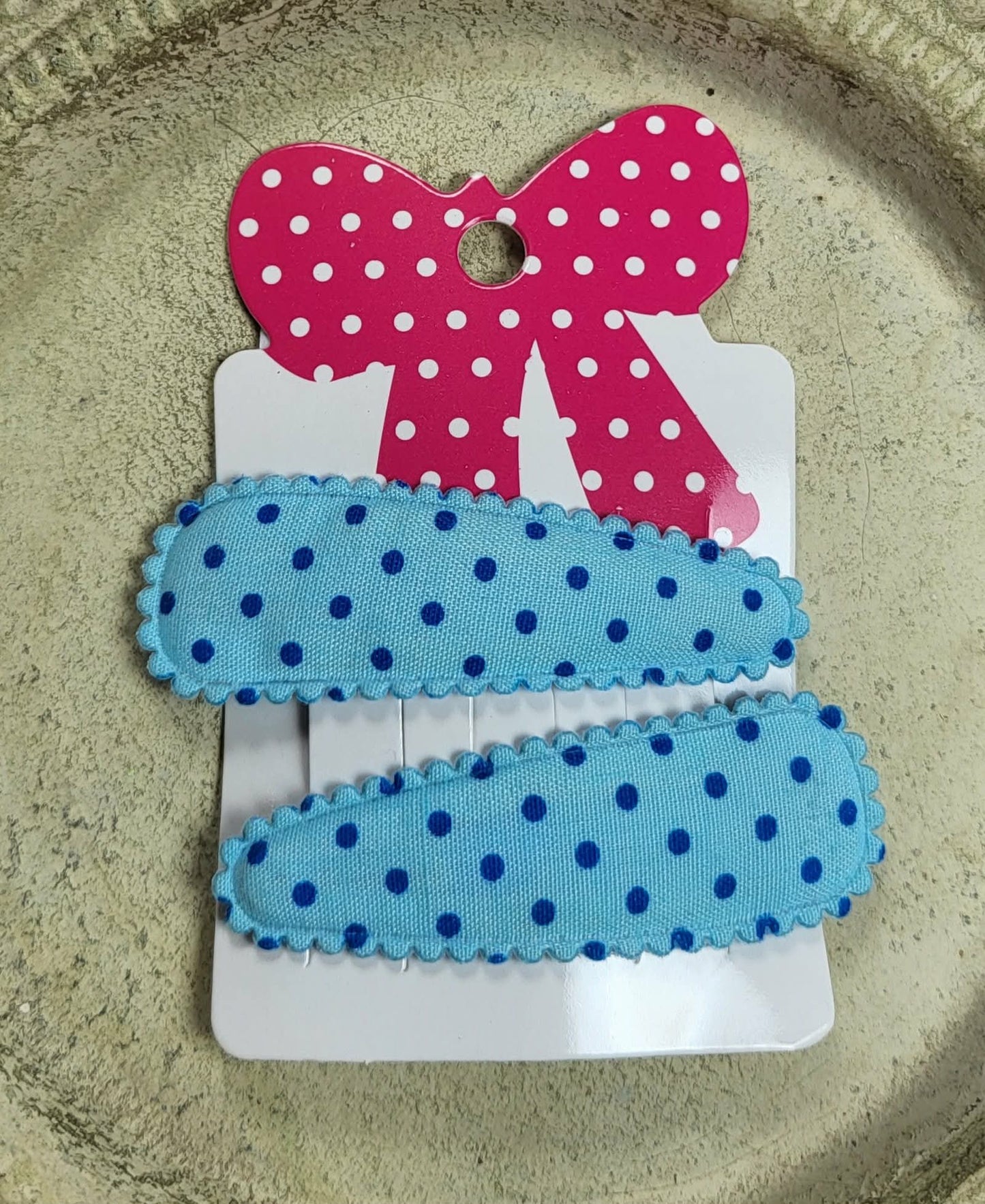 Kind klikspeld lichtblauw met donkerblauwe stippen