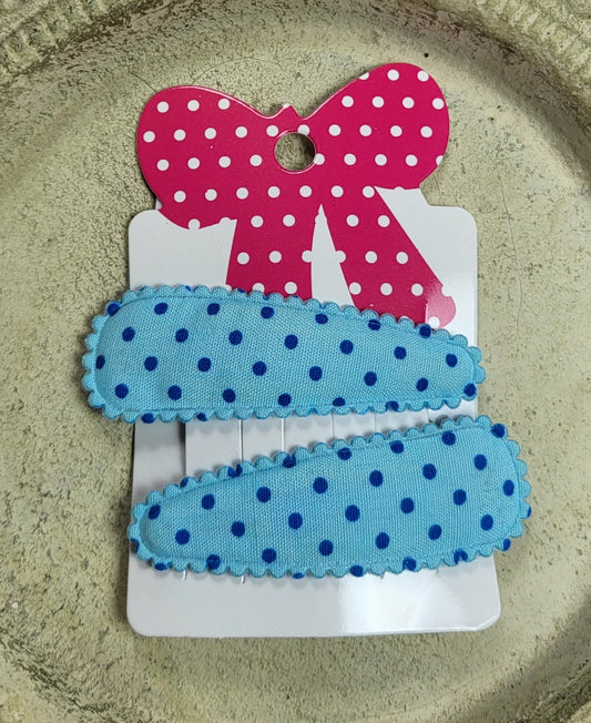 Kind klikspeld lichtblauw met donkerblauwe stippen