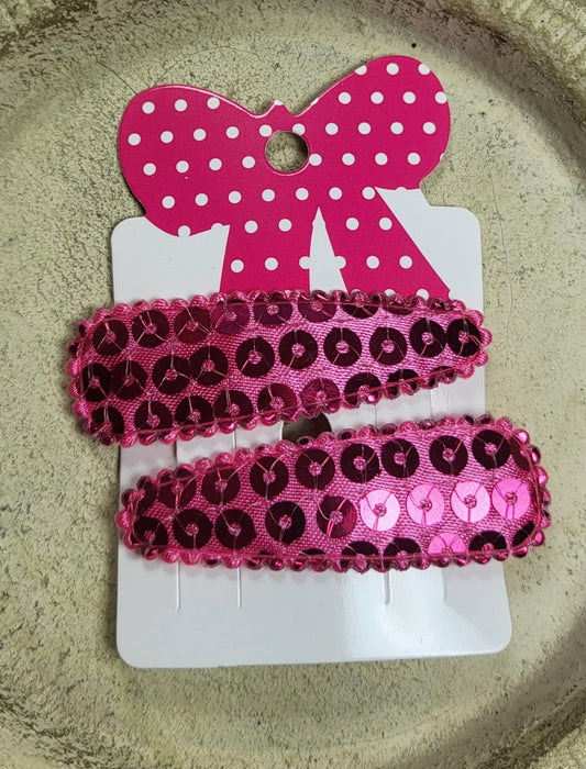 Kind klikspeld roze met roze pailletten